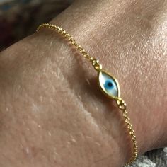 Tiny Evil Eye Bracelet Minimal Bracelet Evil Eye Bracelet | Etsy Gold Spiritual Evil Eye Bracelet For Everyday, Gold Sterling Silver Evil Eye Bracelet, Elegant Evil Eye Chain Bracelet Gift, Spiritual Gold Bracelets With Evil Eye, Gold Spiritual Evil Eye Bracelet Gift, Minimalist Yellow Gold Evil Eye Bracelet Gift, Dainty Oval Bracelets As Gift, Dainty Oval Bracelets For Gifts, Handmade Gold Oval Bracelets