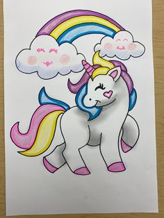 a drawing of a unicorn with clouds and a rainbow