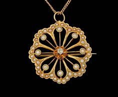 This is a beautiful art nouveau, diamond and seed pearl pendant as well as a pin with a locking c clasp. In pristine condition. Beautiful 14k Yellow Gold. Diamond isn't exceptionally large but has a lot of life and fire! A truly beautiful piece and a perfect example of this time period. Grab it now because I just put it on sale! All questions are welcome! Thank you kindly. Ellen Art Nouveau Diamond Wedding Jewelry, Victorian Diamond Jewelry With Pearl Pendant, Art Nouveau Yellow Gold Diamond Jewelry, Art Nouveau Pearl Pendant Jewelry For Wedding, Art Nouveau Wedding Jewelry With Pearl Pendant, Vintage Eternity Band, Baguette Diamond Band, Yellow Gold Solitaire Ring, Pearl Pin