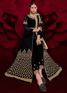 Black Golden Embroidered Slit Style Anarkali Pant Suit In usa uk canada Shop Latest Indian Clothes Collection Of Black Golden Embroidered Slit Style Anarkali Pant Suit Online In Australia, Newzeland. This outfit has beautiful traditional zari, stone and mirror work embroidery detail on slit style georgette top with santoon lining paired with zari embellished santoon pants bottom and embroidery detailed soft net dupatta. This suit set will go well with fancy golden jewellery and heels. This set c Gown Anarkali, Kids Kaftan, Indian Dresses Online, Modest Evening Dress, Women Dress Online, Designer Salwar, Salwar Kameez Online, Designer Anarkali, Casual Saree