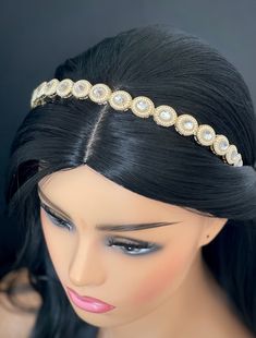 This is an elegant piece of gold finished head band. This statement headband is a show stealer for sure. This gives an unique Contemporary redemption of a Victorian headband with pearls and crystal beads to your bridal look by adding this beautiful Rajasthani traditional jewelry. Superior quality and imitation polki and beads as per international standards. Can go well with traditional wear too. Wear this with open hair or a messy braid whichever is your style statement. Adjustable Headpieces For Wedding And Festivals, Adjustable Wedding Headpiece For Festivals, Gold Bollywood Headpiece For Wedding, Adjustable Tikka For Wedding, Adjustable Bollywood Kundan Necklace, Bollywood Bridal Accessories With Pallu For Festivities, Festive Bollywood Bridal Accessories With Tilla, Traditional Wedding Headband Headpiece, Traditional Gold Headband