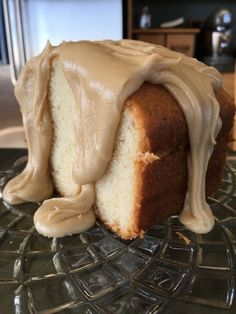 a close up of a cake with frosting on a plate