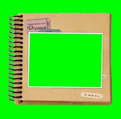 an open notebook with a green screen in front of it