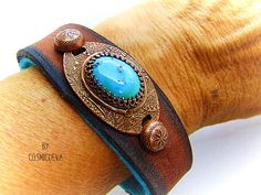 Beautiful one of a kind handcrafted southwestern leather bracelet made of earthy mid-western style brown dyed veg tan leather. The focal point is a natural stabilized Tibet turquoise with a bezel setting in solid copper. Earthy Brown, Leather Cuff Bracelet, Hand Painted Jewelry, Bronze Jewelry, Veg Tan Leather, Mens Leather Bracelet, Southwest Style, Leather Bracelets, Leather Cuffs Bracelet