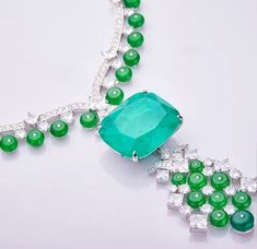 Introducing the epitome of luxury and elegance - the Luxury Fusion Emerald Necklace! For all you Colombian Emerald enthusiasts out there, this exquisite piece is a dream come true. Crafted to exude the opulence and allure of real Colombian emerald, this necklace is a true masterpiece.Featuring part green Cabochon buttons and Zirconite Cubic Zirconia, this stunning necklace is designed to captivate and mesmerize. With its radiant beauty, it's guaranteed to turn heads wherever you go, be it at lux Luxury Emerald Necklace With Jewels For Formal Occasions, Luxury Emerald Necklace With Jewels For Formal Events, Luxury Emerald Necklace For Formal Events, Luxury Emerald Gemstone Necklace For Formal Occasions, Exquisite Emerald Diamond Necklace, Exquisite Emerald Necklace For Formal Occasions, Exquisite Brilliant Cut Emerald Necklace, Exquisite Emerald Necklace, Luxury Hand Set Round Emerald Necklace