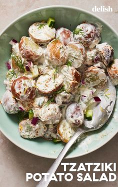 a bowl filled with potato salad on top of a table