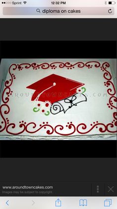 a decorated sheet cake with a graduation cap and scroll on the side, in red and white icing