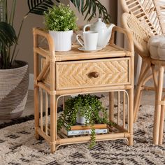 a table with two plants on top of it next to a wicker chair and potted plant