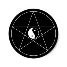 a black and white yin yang symbol with a pentagramil in the center on a white background