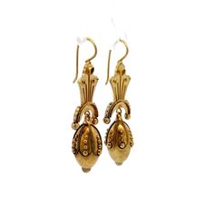 Step back in time with these exquisite Victorian drop earrings, truly a treasure from the 19th century. Crafted in 15 karat yellow gold, these antique earrings showcase the ornate detailing characteristic of the Victorian era. Each earring features intricate scrollwork and hollow elements that contribute to their lightweight feel, making them comfortable for all-day wear. These elegant drop earrings are perfect for anyone who appreciates the beauty of antique jewelry and the rich stories they hold. A timeless set of earrings that add a touch of history and elegance to any outfit! Historical Yellow Gold Drop Earrings, Yellow Gold Historical Drop Earrings, Yellow Gold Drop Earrings With Historical Design, Antique Drop Earrings With Historical Design, Antique Gold Earrings With Historical Design, Antique Earrings With Historical Design For Ceremonial Occasions, Traditional Yellow Gold Earrings With Historical Design, Antique Filigree Earrings For Ceremonial Occasions, Antique Yellow Gold Ceremonial Earrings