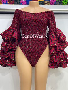 A must have Ankara bodysuit for ladies ,it can be paired with jeans, pant, skirt etc.  It can be worn to any occasion and looks really amazing, they are made out of pure cotton Ankara fabrics.  Every woman needs this beautiful piece in her wardrobe. Ankara Bodysuit, Trendy Stretch Cotton Bodysuit, Stretch Cotton Bodysuit With Lined Body, Trendy Fitted High Waist Bodysuit, Fitted One-piece Bodysuit With Ruffles, Trendy High-waist Fitted Bodysuit, Fitted Long Sleeve Bodysuit With Floral Print, Fitted Ruffles Bodysuit, Trendy Fitted Cotton Bodysuit