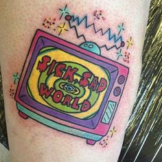 an old school tv tattoo with the words tick - tap world on it's side