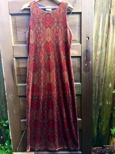 "Gorgeous vintage 90's shimmering nouveau stained glass print stretch velvet maxi dress. Pictures cannot capture the fantastic shimmer and colors of this dress! Burnt red, with gold and black tones. This print is so amazing, like wearing the best demask wallpaper you've ever seen. Comfortable and delicious feeling. Made by AGB, Byer California. Excellent vintage condition. Size small, will fit medium beautifully. I am 5'4 and the length of this dress is perfect on me. Measurements laying flat: f Fall Fitted Velvet Maxi Dress, Fitted Velvet Maxi Dress For Fall, Fitted Long Velvet Dress, Dress Pictures, Black Tones, Burnt Red, Velvet Maxi Dress, Velvet Maxi, Glass Print