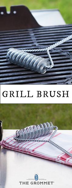 the grill brush is laying on top of the table next to an empty glass bottle