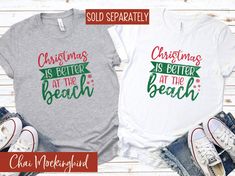 Christmas is Better at the Beach Shirt Chai Mockingbird is on a mission to spread loving positive energy with words that matter. What better way to do that than on a mug!   WANT TO SEE MORE  forage through our shirt collection https://www.etsy.com/shop/chaimockingbird?section_id=24916829 or use the SEARCH BOX on the LEFT SIDE of the shop page to explore other options https://www.etsy.com/shop/chaimockingbird?search_query=Sweatshirt  SHIRT DETAILS    A great t-shirt that complements any outfit. It's made of a heavier cotton and the double-stitched neckline and sleeves give it more durability, so it can become an everyday favorite. Pre-shrunk for extra durability Gildan Shirts 35% Cotton, 65% Polyester Bella+Canvas Shirts 52% Cotton, 48% Polyester Bella+Canvas Long Sleeve Shirts 52% Cotton, Christmas Beach Vacation Shirts, Tropical Christmas, Beach Christmas, Beach Lover, Gildan Sweatshirts, Beach Shirt, Vacation Shirts, Beach Lovers, Vacation Beach