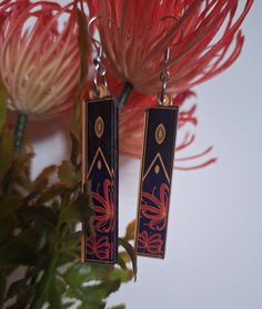 Designed by me, these are subtly designed earrings themed on the character Blade from Honkai Star Rail! If you're a fan of spider lilies, then this design is also for you! Dangly earrings made with recycled acrylic with silver plated earring wire. Size of acrylic charm is 5cm long and 1cm wide, weighing approx 4g each. B grade earrings have printing errors (as seen in latter photo). Spider Lilies, Spider Lily, Earring Wire, Types Of Earrings, Craft Jewelry, Fan Earrings, Honkai Star Rail, Acrylic Charms, Dangly Earrings