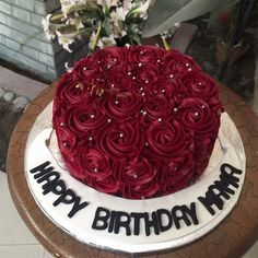 a heart shaped cake on top of a table