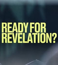 a man standing in front of a microphone with the words ready for revelation?