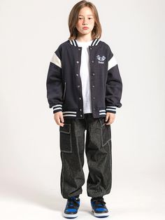 This unisex Junior varsity jacket features a trendy oversized fit with shoulder color blocking and premium embroidery, available in Navy and Black colorways. Crafted from domestically-manufactured double-brushed fabric with reinforced triple stitching, the jacket offers both durability and comfort with excellent ribbing elasticity at the collar, cuffs, and hem. The size range accommodates children from 8+ years (S/140) to 14+ years (XL/170), making it a versatile choice for growing kids and fami Puffer Parka, Parka, Varsity Jacket, Color Blocking, Puffer, Jumper, Kids Outfits, Stitching, Range