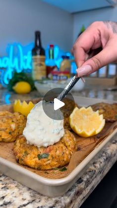 Tasty on Instagram: "Crab Cakes on deck, ‘tis the season to snack! 🦀🎉

1 egg
1/4c mayonnaise
1tbs lemon juice
1 heaping tablespoon Dijon mustard
1tbs worcestershire sauce
Splash of tabasco
1tbs finely chopped parsley
1tbs old bay
1/4tsp garlic powder
1lb lump crabmeat
1/2 sleeve ritz crackers

Mix together your wet ingredients plus parsley, old bay, and garlic powder until fully combined. Gently fold in your crabmeat and crushed crackers. Do not overmix. Once done, separate into large balls, and top each ball with about 1/2 tbs butter and bake @450° for 12-15 broiling for the last two until golden brown. Serve with tartar sauce and enjoy!"