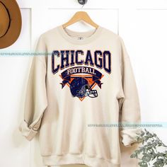 Chicago Football Vintage Sweatshirt T-Shirt,Retro Chicago Bear Football Sweatshirt , Chicago Bear Fan Gift , Sunday Football FBC12 **Please note this product is offered in multiple styles (Sweatshirt/T-shirt). Please make sure to choose the correct style you wish to purchase. ⭐𝐐𝐔𝐀𝐋𝐈𝐓𝐘: At Sports Spectra our brand believes in using the best materials to create our designs. We use high-quality ink to achieve vibrant and colorful prints that stand the test of time. Our products are crafted f Retro Fan Merchandise Tops For Fall, Retro Fall Tops For Fan Merchandise, Fall Team Spirit T-shirt With Crew Neck, Fall Season Team Name T-shirt With Crew Neck, Vintage Crew Neck Top With Team Logo, Fan Apparel Short Sleeve Graphic Sweatshirt, Fall Fan Gear T-shirt With Crew Neck, Fall Crew Neck T-shirt For Fan Gear, Retro Crew Neck Tops For Sports Season