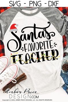 a white and gray shirt with the words santa's favorite teacher on it next to some sneakers