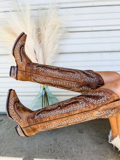 These cowboy boots are a must have in your closet. They are a literal staple piece. These knee high boots feature rhinestones throughout the boot. They are genuine leather handmade in Mexico. We recommend ordering your normal boot size as these do run true to size. Our model is 5'4 wearing a 9, her normal shoe size. Fashionable Cowgirl Outfits, Western Boots Wedding, Knee High Cowboy Boots Outfit, Over The Knee Cowboy Boots, Knee High Cowgirl Boots, Boot Wall, Western Footwear, Tall Cowgirl Boots, Cowboy Killer