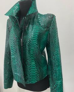 Emerald Women's Snakeskin Jacket PREMIUM QUALITY LUXURY STYLE Outside: GENUINE GLOSSY PYTHON LEATHER Accessories: silver color (please see the photo). All our products are 100% handmade, we always try to create interesting ideas to make your style unique. We use only the highest quality materials and accessories from around the world and only best leather from Indonesia. Before listing each new model undergoes different quality and usability tests at every stage of production. Every single piece Green Fitted Leather Jacket With Zipper Closure, Fitted Green Leather Jacket With Zipper, Fitted Green Leather Jacket With Zipper Closure, Fitted Green Leather Jacket With Long Sleeves, Green Leather Jacket With Zipper, Green Leather Jacket With Zipper Closure, Green Long Sleeve Biker Outerwear, Green Long Sleeve Biker Jacket, Green Long-sleeve Biker Outerwear