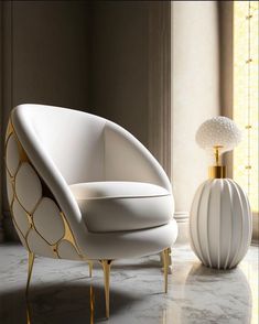 a white chair sitting next to a vase on top of a marble floor in front of a window