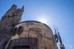 the sun shines brightly over an old building