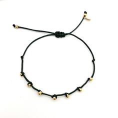 Dainty and minimal Bracelet with beads. Fashion forward delicate and essential! This bracelet is adjustable with macrame knot to fit almost every wrist size. Please choose color of string in options. D E T A I L S: M A T E R I A L S: * Beads 14K Gold Plated * Cotton cord SIZE * Beads: 3.2mm aprox * Bracelet is adjustable C R A F T S M A N S H I P ∙ & ∙ L O V E: * Hand-made by me * Happiness guarantee: we want you to LOVE your new jewelry! S E E ∙ O U R ∙ S H O P Be sure to check out more bea Gold Beads Bracelet, String Friendship Bracelets, Cotton Cord Bracelet, Bracelet Couples, Bracelet With Beads, Bracelet Matching, Bracelet String, Minimal Bracelet, Beads Fashion