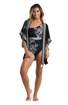 This lightweight cover-up is highlighted by a border print and fringed tassels for a style that's ready for a sunny getaway. Open front Elbow-length sleeves 100% viscose Hand wash, line dry Imported Black Bohemian Cover-up For Pool, Bohemian Black Cover-up For Pool, Black Bohemian Pool Cover-up, Bohemian Black Pool Cover-up, Black Tassel Cover-up For Beach Season, Spring Open Front Cover-up With Tassels, Spring Beachwear Cover-up With Tassel Ties, Spring Vacation Swimwear With Tassels, Spring Pool Cover-up With Tassels