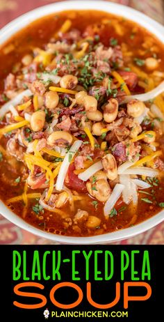 black - eyed pea soup in a white bowl topped with cheese and onions