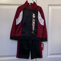 Brand New, With Tags, Nike Air Jordan Jumpman 2pc Tracksuit That Comes With Jacket And Pants. Classic Outfit Is In Burgundy Red And Black In Size 24mo. Jacket Has Zipper With Air Jordan Emblem And Pants Have Elastic Waist. Red Hooded Winter Set, Sporty Red Long Sleeve Set, Red Sports Sets For Winter, Red Winter Sports Sets, Red Long Sleeve Sports Sets, Baby Boy Overall, Baby Boy Disney, Air Jordan Red, Minnie Mouse Skirt