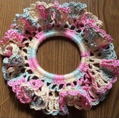 a crocheted doily is sitting on a table