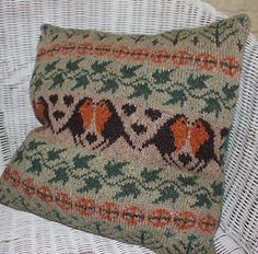 a pillow sitting on top of a wicker chair