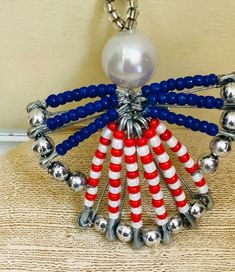 an ornament made out of beads and bells