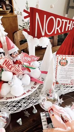 a table topped with lots of christmas decorations