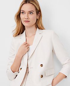 Elevate your wardrobe with the Ann Taylor Cropped Double Breasted Blazer in Textured Stretch, a perfect blend of sophistication and modern style. This blazer features:

- Size: 12
- Color: Bleached Almond
- Gender: Female
- Material: Shell - 66% Polyester, 32% Viscose, 2% Spandex; Lining - 100% Polyester
- Notched lapel and long sleeves with functional buttons for versatile styling
- Double-breasted button front and front flap besom pockets
- Length: 19 inches long, hits at waist

Crafted from a Female Features, Knitted Suit, 40 Dress, Style Steal, Cropped Blazer, Breasted Blazer, Double Breasted Blazer, Effortless Style, Ann Taylor