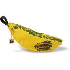 a banana with a keychain hanging from it's side on a white background