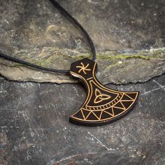 Black Viking Engraved Jewelry, Engraved Viking Style Necklace, Adjustable Black Carved Necklace, Traditional Black Engraved Necklace, Black Carved Symbolic Necklace, Black Symbolic Carved Necklace, Symbolic Black Carved Necklace, Traditional Black Jewelry With Adjustable Cord, Black Engraved Jewelry For Festivals