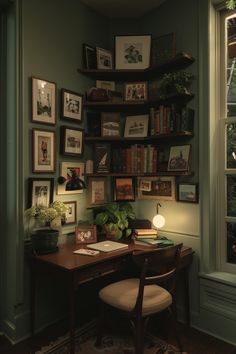 a room with a desk, chair and bookshelf full of pictures on the wall