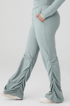 Smooth and snatched up top, ruched and relaxed down low. The Ruched Soft Sculpt Pant has it both ways with a skinny elastic waist band and wide leg fit that puddles at the hem. So soft in French terry and elevated for right now, this pant will become a new go-to. Wear it out with the matching bra tank or long sleeve top for the win. Super-soft, micro French terry Wide leg flare pant with trendy ruching detail Designed & uniquely fit to flatter every size Wear-tested by our in-house team for the Alo Yoga Wide Leg Pants With Elastic Waistband, Alo Yoga Wide Leg Casual Bottoms, Versatile Alo Yoga Bottoms, Alo Yoga Fitted Bottoms For Fall, Fitted Alo Yoga Bottoms For Fall, Casual Ruched Wide Leg Pants, Casual Wide Leg Ruched Pants, Relaxed Fit Yoga Bottoms With Drawstring, Casual Alo Yoga Pants For Yoga