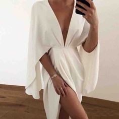 deep v neck lantern sleeve dress chiffon white dress open back long sleeve short dress ruffled trim white mini dresses #minidress #minidresses #lanternsleeve #longsleeve #shortdress #ruffled #whitedress Cape Sleeve Dress, Cape Sleeves, Linnet, Cape Dress, Trend Fashion, Fabulous Fashion, Mode Inspiration, Chic Dress, Stunning Dresses