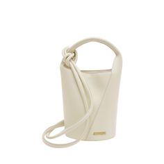 Jacquemus "Le Petit Tourni" bucket bag in leather  Top handle  Adjustable shoulder strap  Can be worn as a top handle or shoulder bag  Open top with snap closure  Interior, one zip pocket and one slip pocket  Lining: Cotton Approx. 5.5"H x 9.1"W x 2.8"D Made in Italy Leather Bucket Bag, Leather Bucket, Open Top, Snap Closure, Top Handle, Bucket Bag, Zip Pockets, Tops Designs, Shoulder Strap