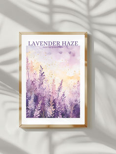 the lavender haze poster is hanging on a white wall with shadow from it's leaves