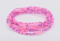 Stretch Seed Bracelets, Seed Bead Bracelet, Friendship Bracelet, Beaded Bracelet, Stackable Bracelet, Bead Bracelet, Pink Bracelet, Purple Bracelet, Hippie Bracelet Build your own set. They can be bought in a set of 3 or set of 5. These seed beads are 11/0 in size. All bracelets for me to size 7 to fit an average size wrist. Do to limited beads, I can only make these smaller.  Put smaller size in the notes section at checkout.  Care Roll on your wrist and roll off. The elastic cord is sturdy but Adjustable Pink Beaded Necklace For Friendship, Pink Wrap Bracelet With Round Beads For Gifts, Pink Friendship Bracelets With Faceted Beads, Pink Braided Bracelets With Round Beads For Beach, Pink Braided Bracelets With Round Beads, Handmade Pink Wrap Bracelet With Round Beads, Pink Wrap Bracelet With Round Beads, Seed Bracelets, Bracelet Violet