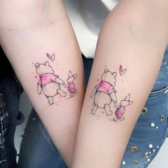 two people with matching tattoos on their arms