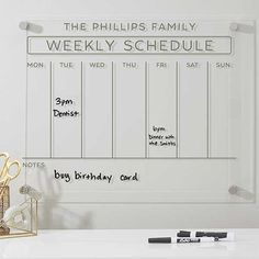 a white board with the words weekly schedule written on it