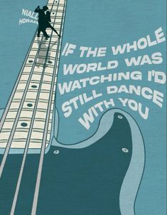 a man climbing up the side of a tall building with words written on it that read if the whole world was watching i'd still dance with you